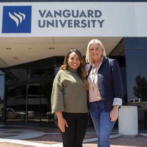 Dr. Brenda Gesell, left, the Vanguard University director of the graduate program in clinical psychology, and Dalila Perea, a VU graduate and young counselor from Santa Ana stand together on campus.(Scott Smeltzer / Staff Photographer)