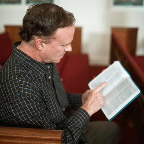 Man reading Bible